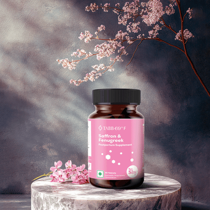 TABB-69®️ F Women’s Vitality Supplement Bottle – Saffron & Fenugreek – Plant-Based Formula with Floral Backdrop